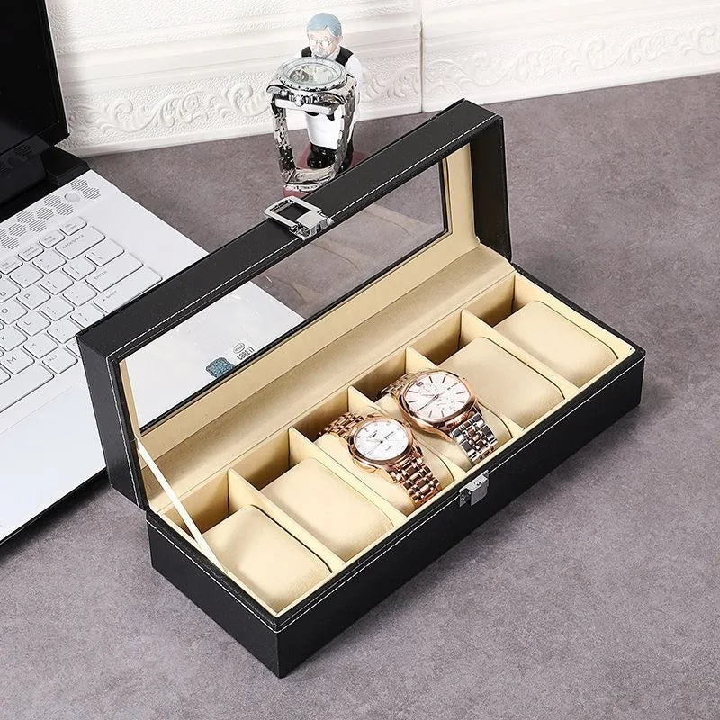Watch box transparent window lid showing organized luxury watch collection