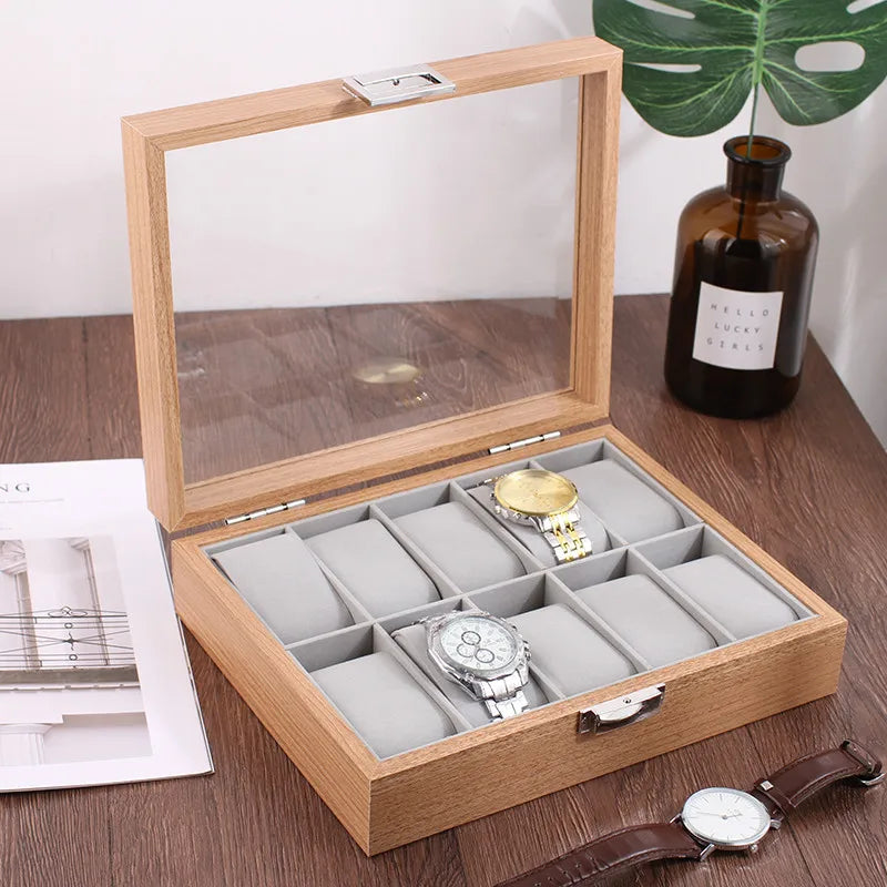 Bamboo watch box open showing multiple watch compartments