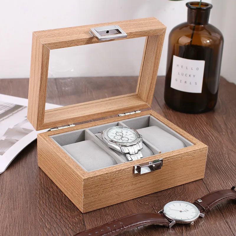 Watch box with 6 slots storing watches neatly on a dresser
