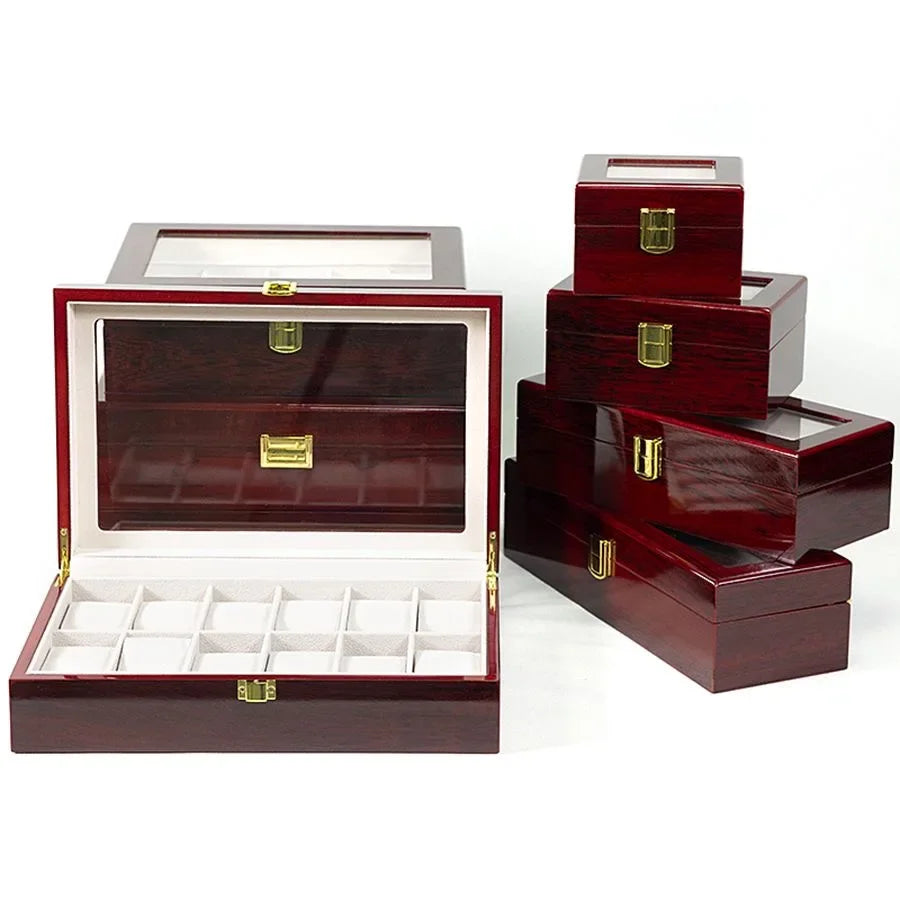 Close-up of removable cushioned compartments inside a wooden watch storage case