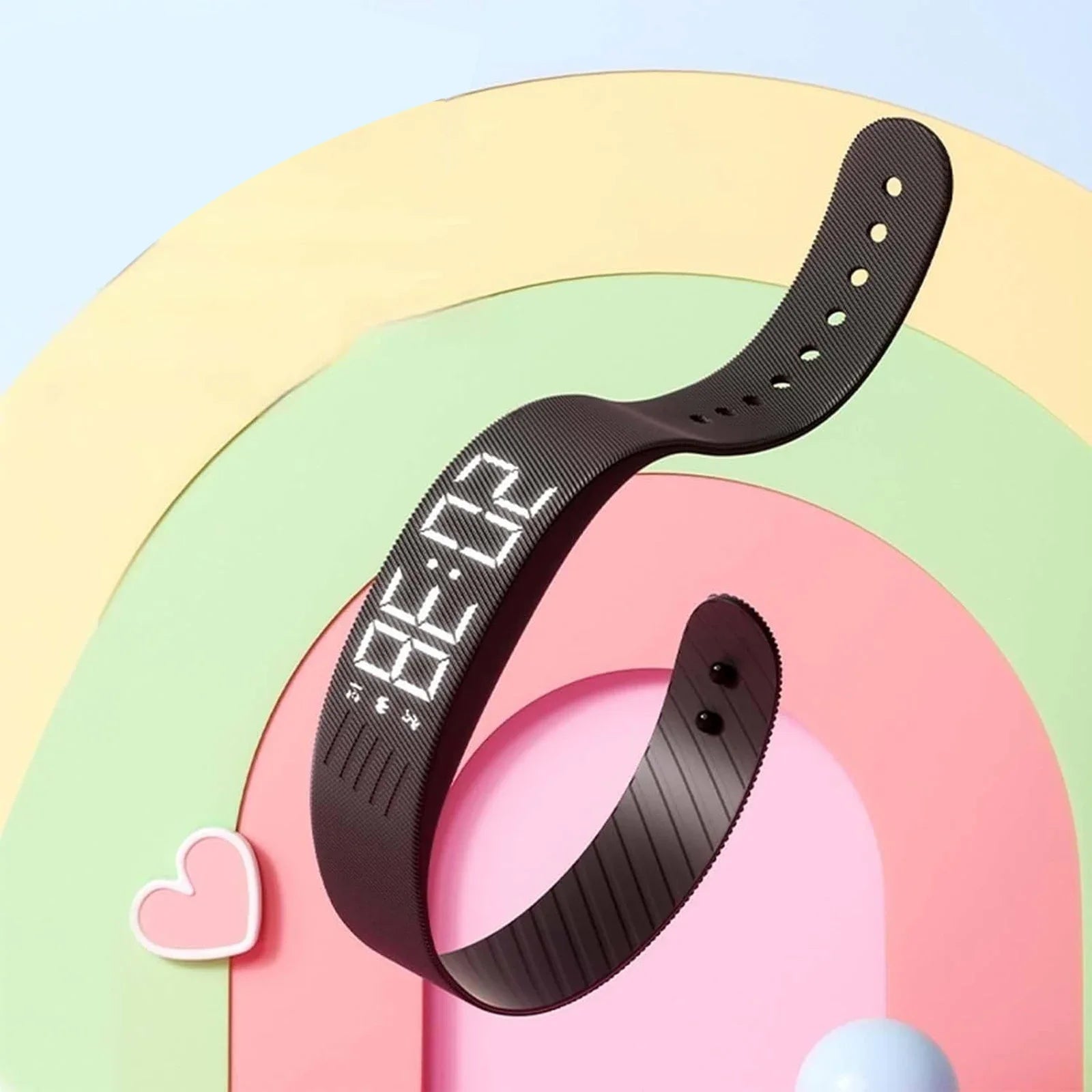 Vibrating bracelet in pink and blue color options flat lay