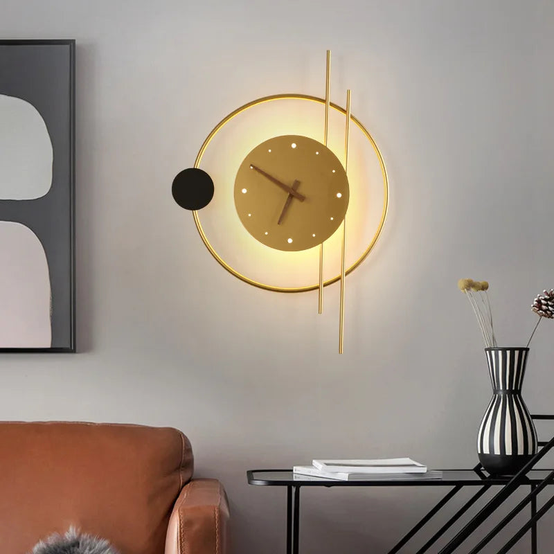 Gold LED wall sconce clock showing iron and acrylic construction detail