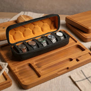 Hard shell travel watch case open showing fitted watch pillows and microfiber lining