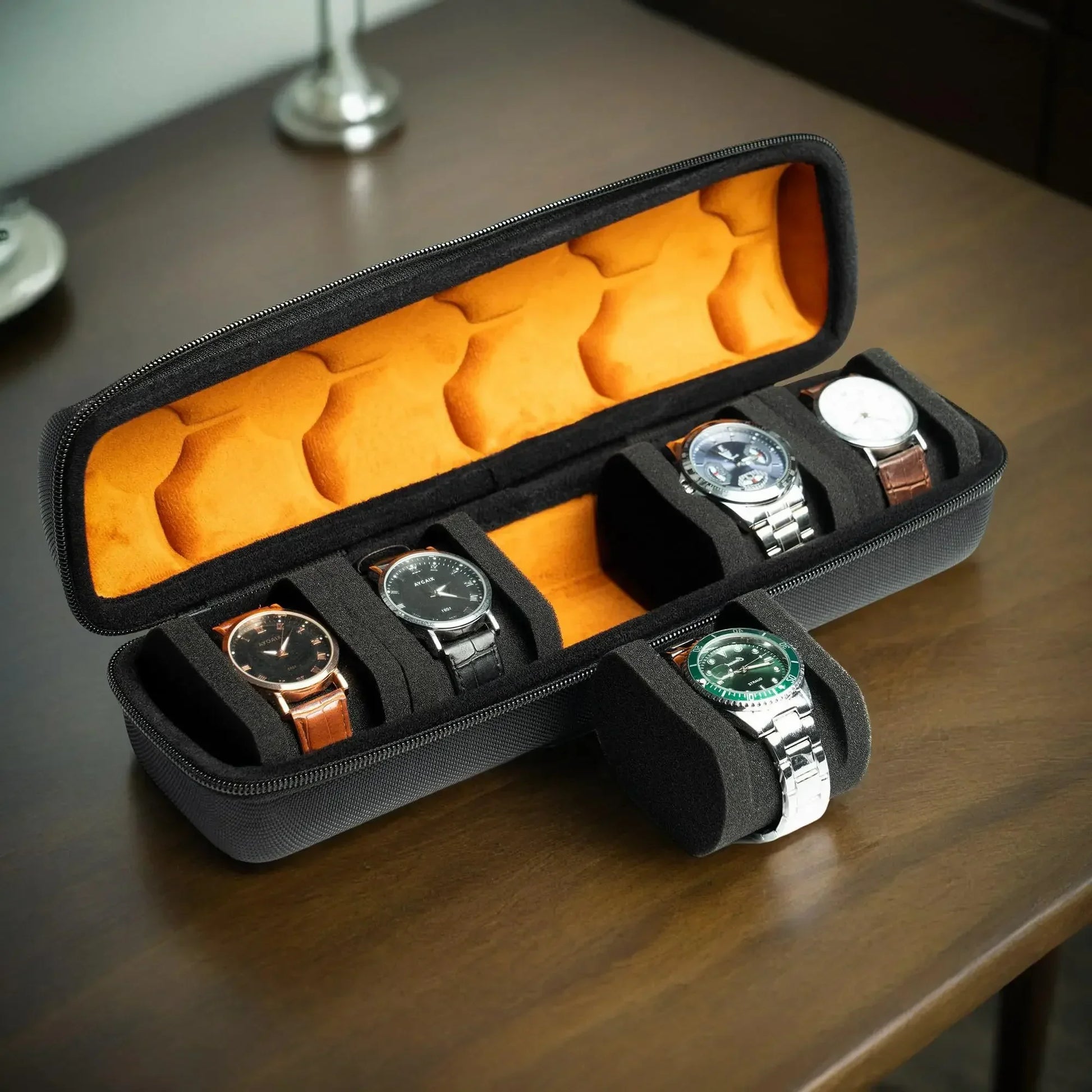 Black travel watch case with multiple slots holding watches securely