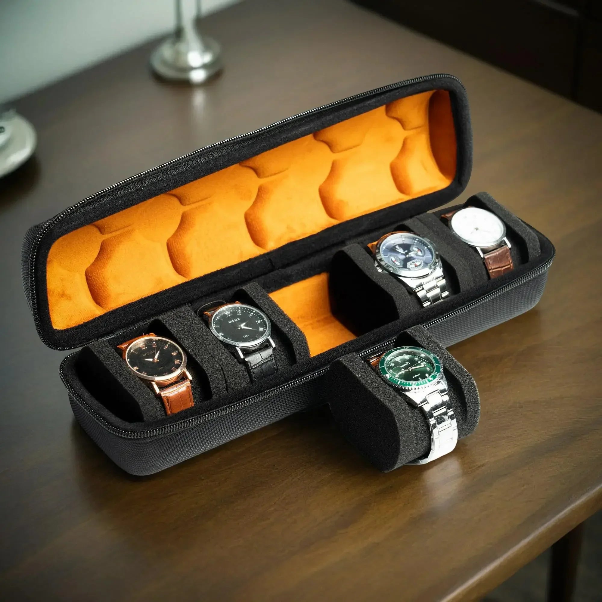 Black travel watch case with multiple slots holding watches securely