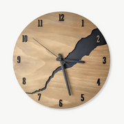 30 cm crackled wood wall clock with bamboo frame on a white living room wall