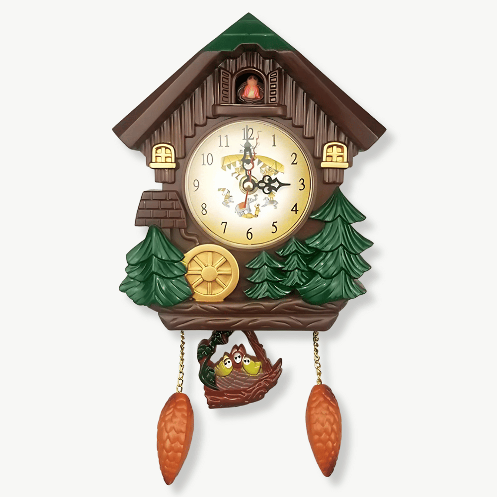 Forest cuckoo wall clock with animated pendulum hanging on a white wall