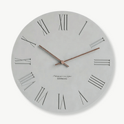 Minimalist wood wall clock 30 cm hanging on a white living room wall