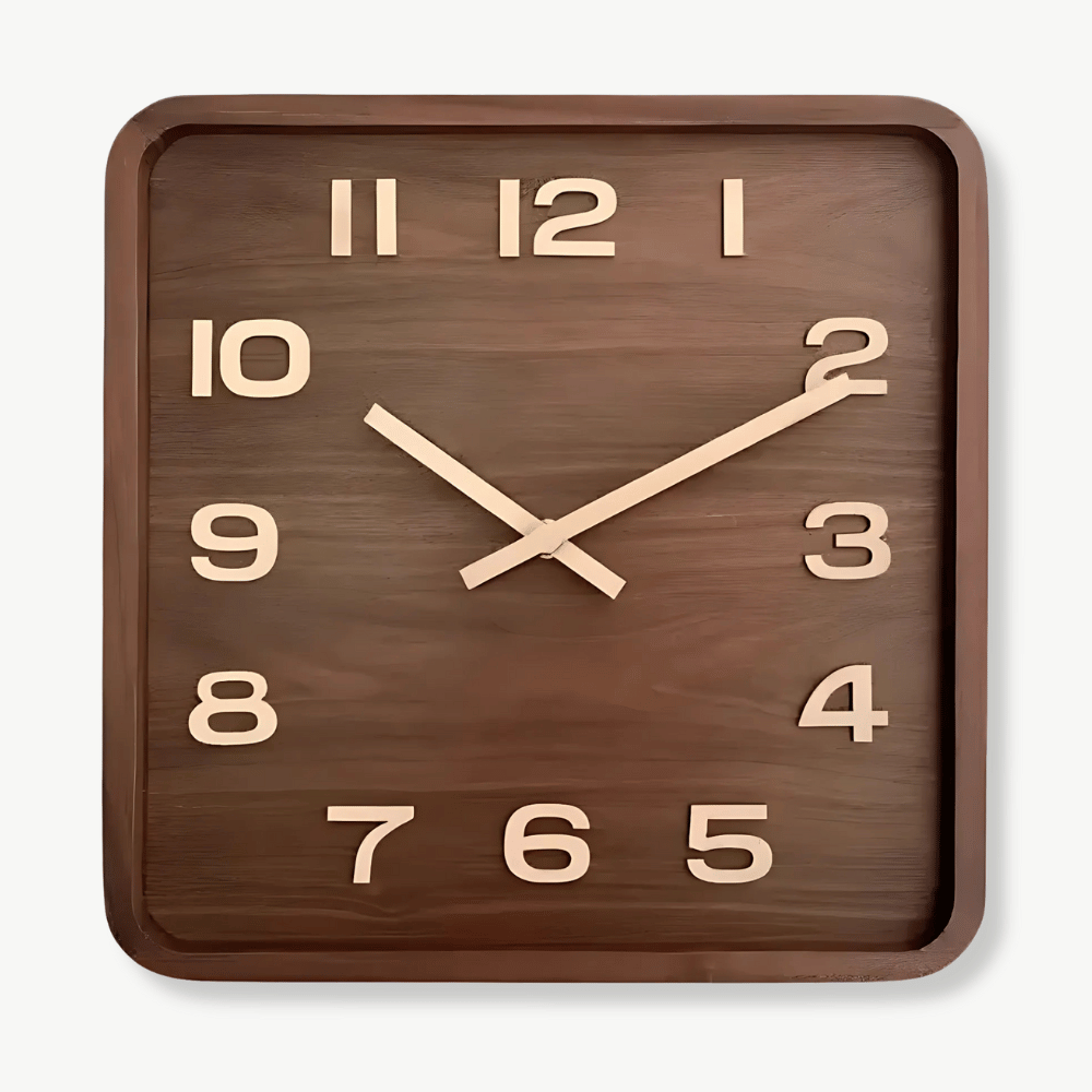 Square solid wood wall clock with silent quartz movement on a white wall