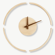 Minimalist circle bamboo wall clock 35 cm on a white wall