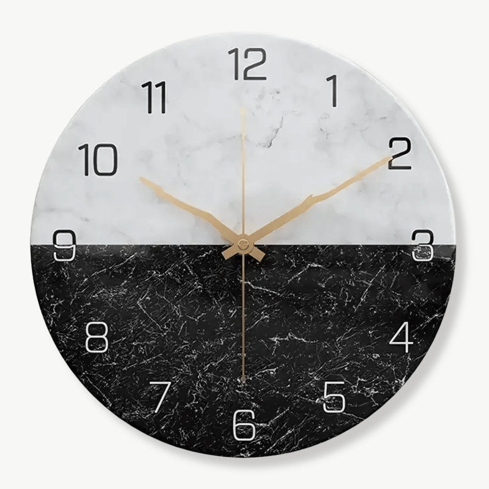 Modern marble effect wall clock in white and black on a living room wall