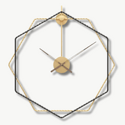 Gold octagon metal wall clock 50 cm on a white living room wall