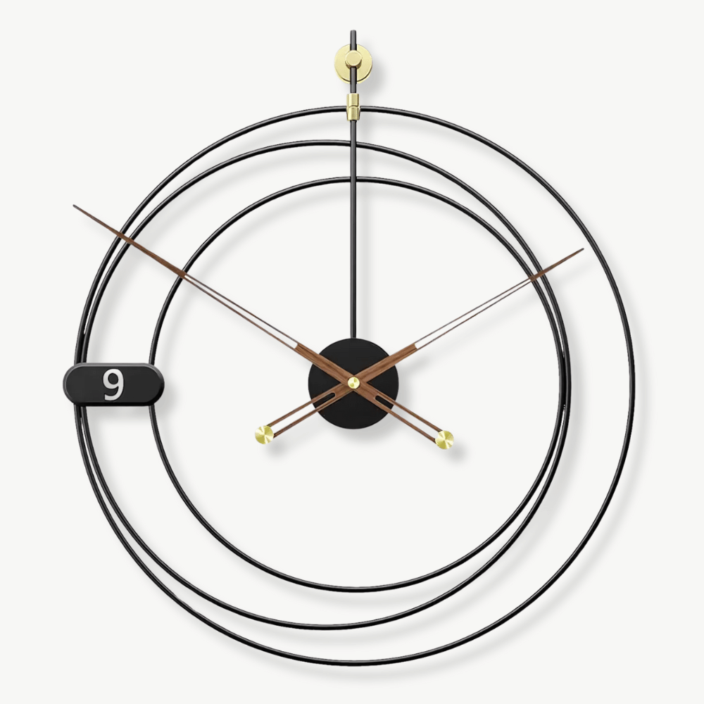 Modern geometric metal wall clock with unique dial pattern on a white wall