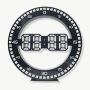 3D LED digital wall clock with red LED display on white frame mounted on living room wall
