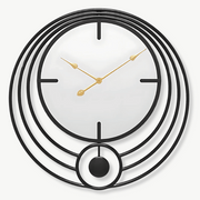 50 cm circular mirror wall clock in black metal on a modern living room wall