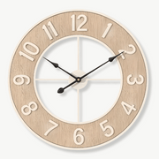 Scandinavian natural wood wall clock 60 cm on a white wall