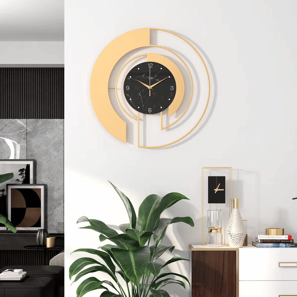 Gold finish Prestige Circle Wall Clock mounted on a modern living room wall