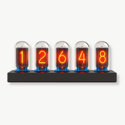 Futuristic Nixie LED clock with glowing LED digits on aluminum body