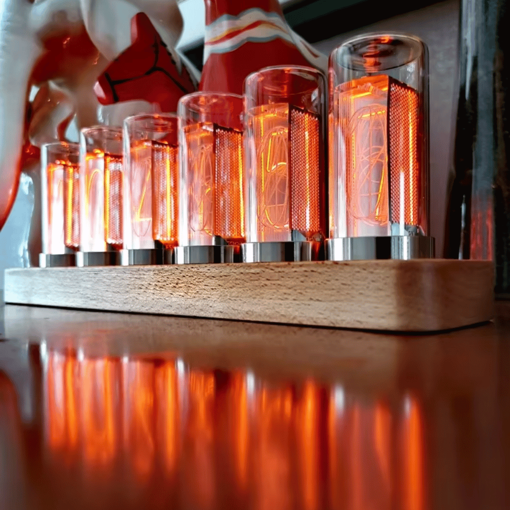 4-tube Nixie clock with backlight on a nightstand
