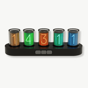 Nixie RGB Design Clock with glowing retro tubes and rainbow LED display on a desk