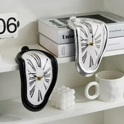 Surrealist wall clock with Plexiglas mirror in gold finish, Dali-inspired design