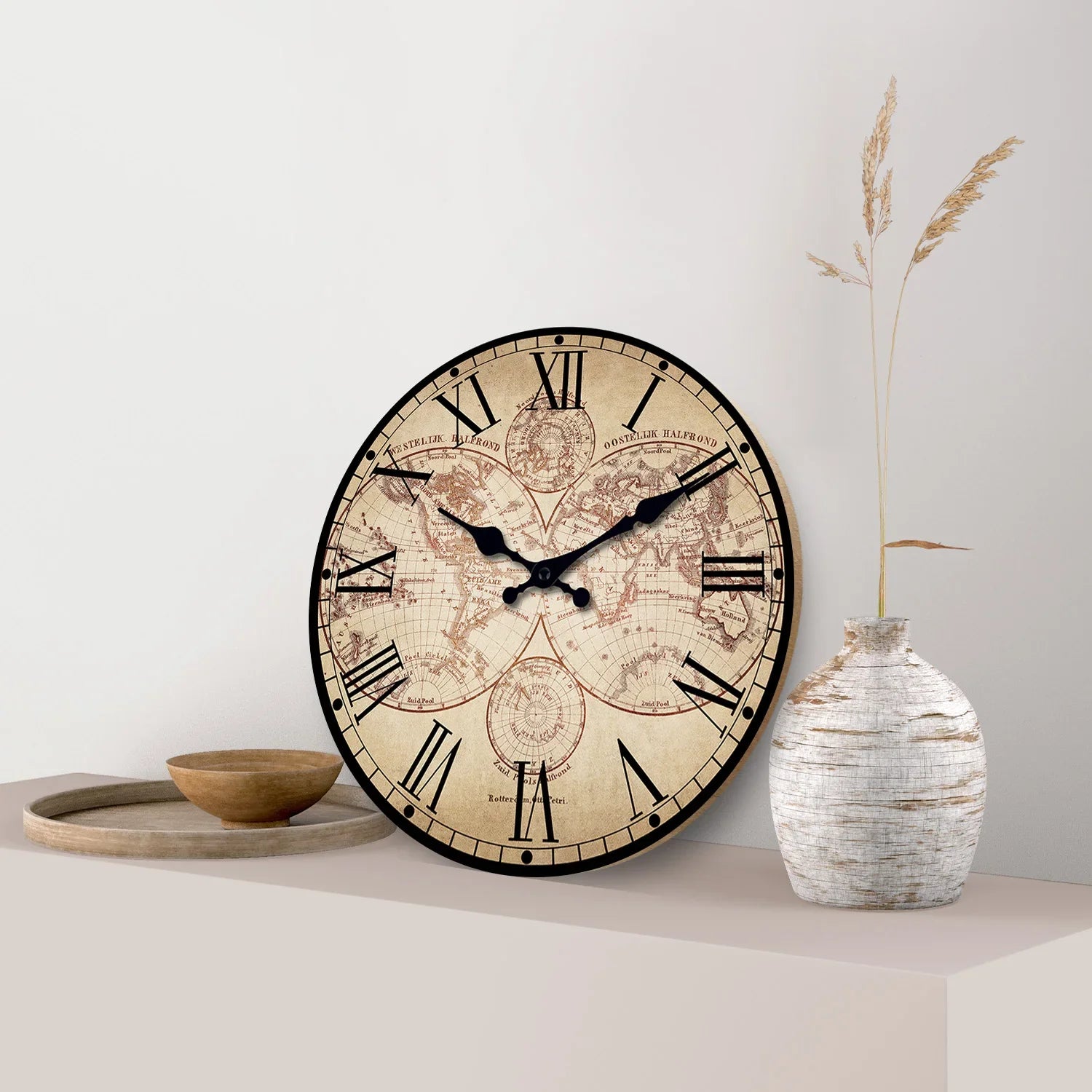 Silent quartz compass wall clock hanging in a living room