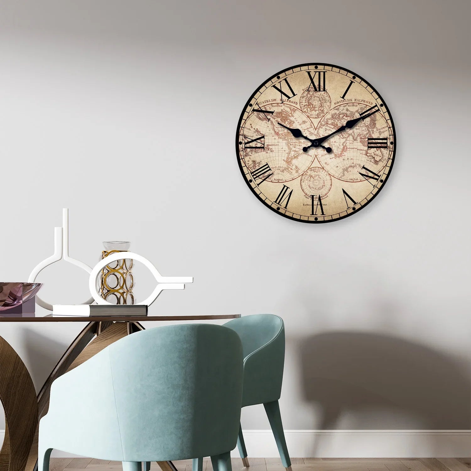 Compass wall clock displayed in a coastal-style bedroom
