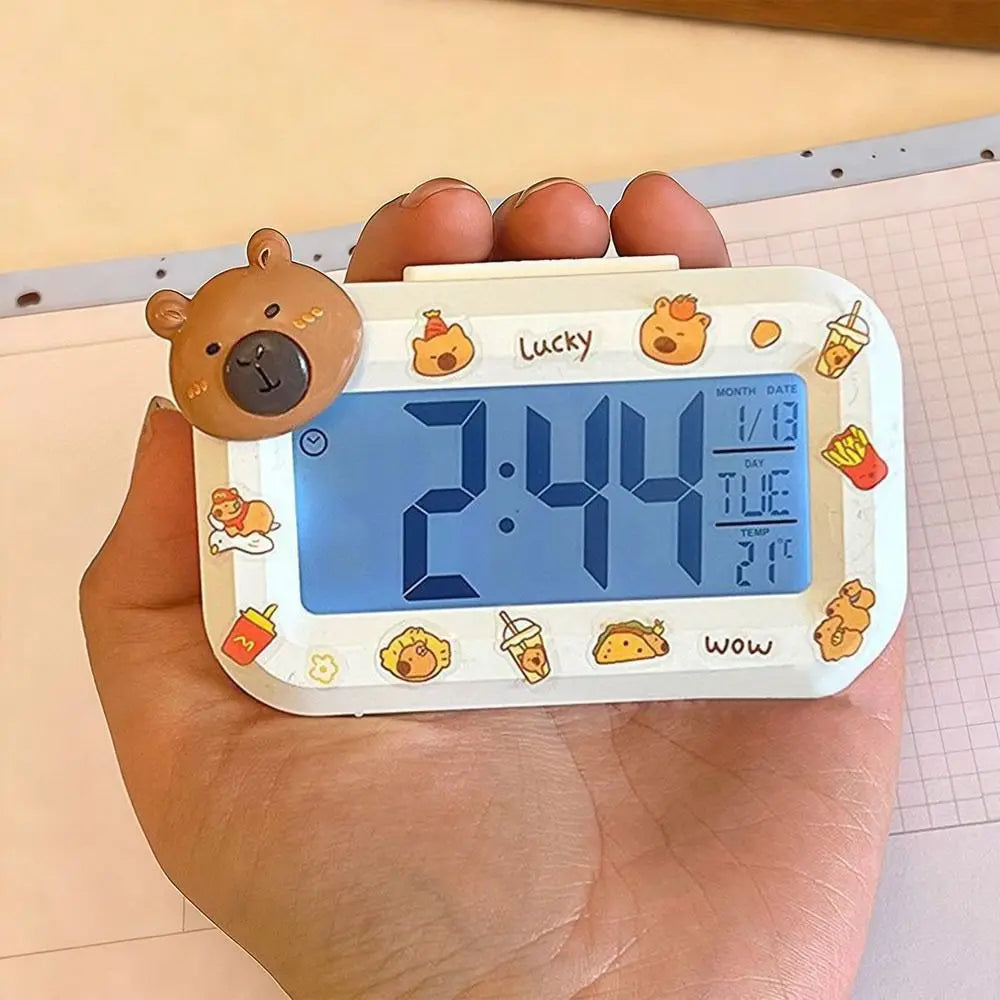 Compact LED clock showing time and indoor temperature reading