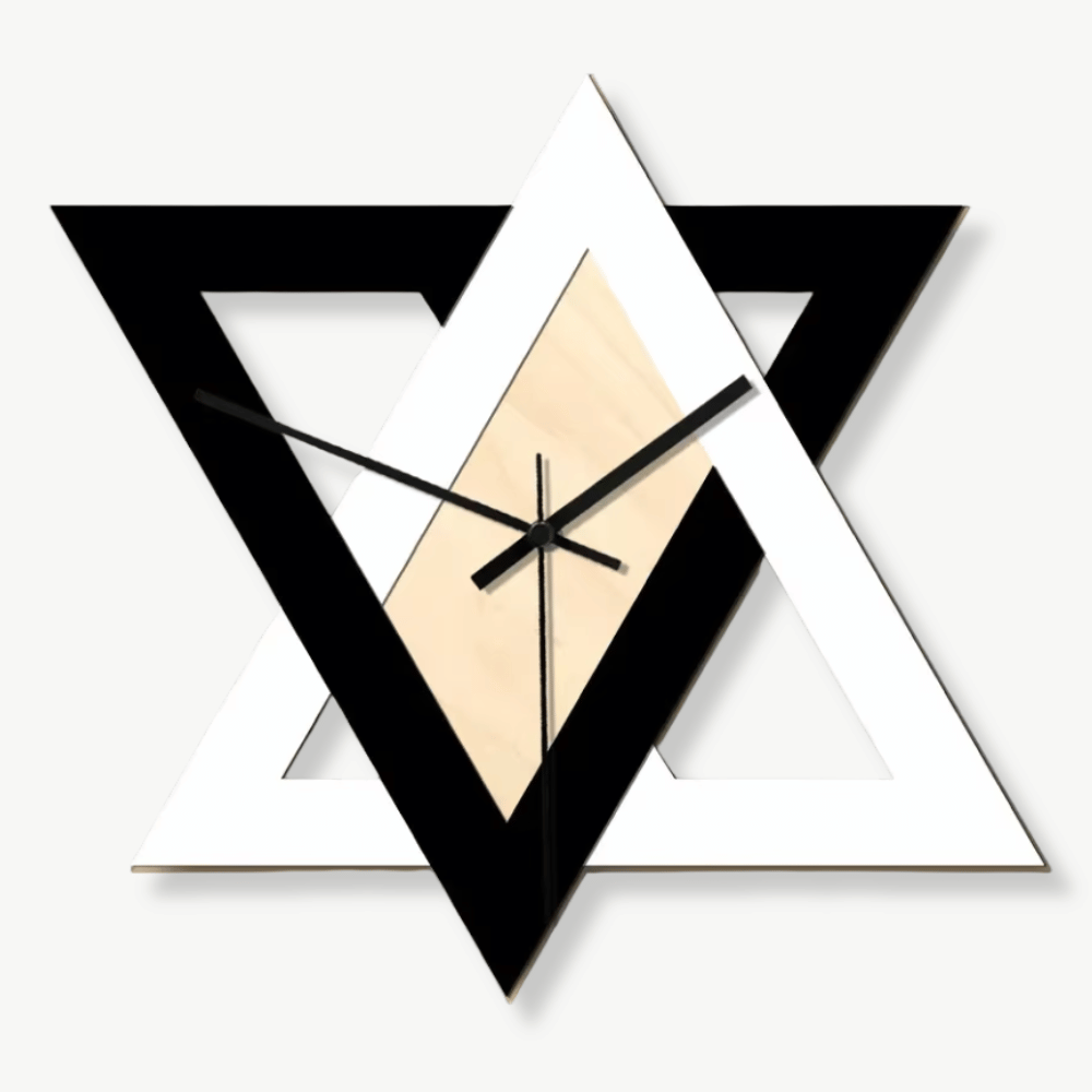 Black and white triangle wall clock with geometric design on a light wall