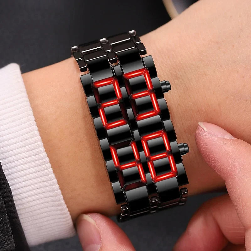 Black and red LED digital watch showing alarm and 24-hour mode