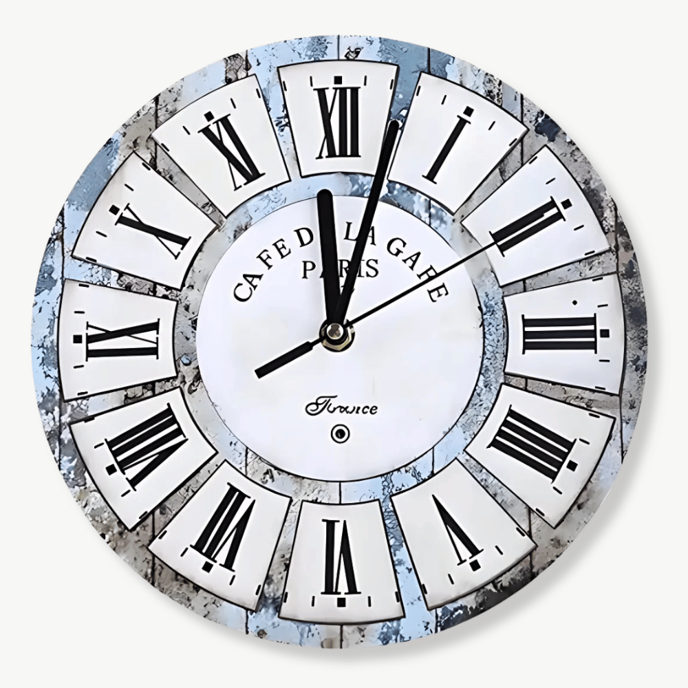 Small vintage wood wall clock with Roman numerals on white wall