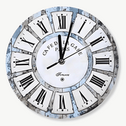 Small vintage wood wall clock with Roman numerals on white wall