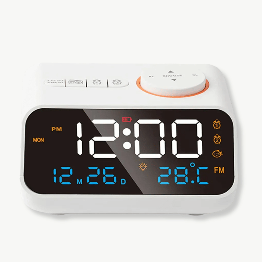 Black LED FM radio alarm clock on nightstand showing time and temperature
