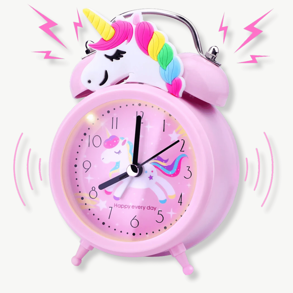 Pink unicorn alarm clock with dual bell on a kids bedroom nightstand