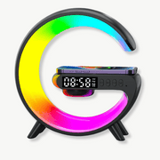 RGB alarm clock with wireless charger glowing in blue on a nightstand