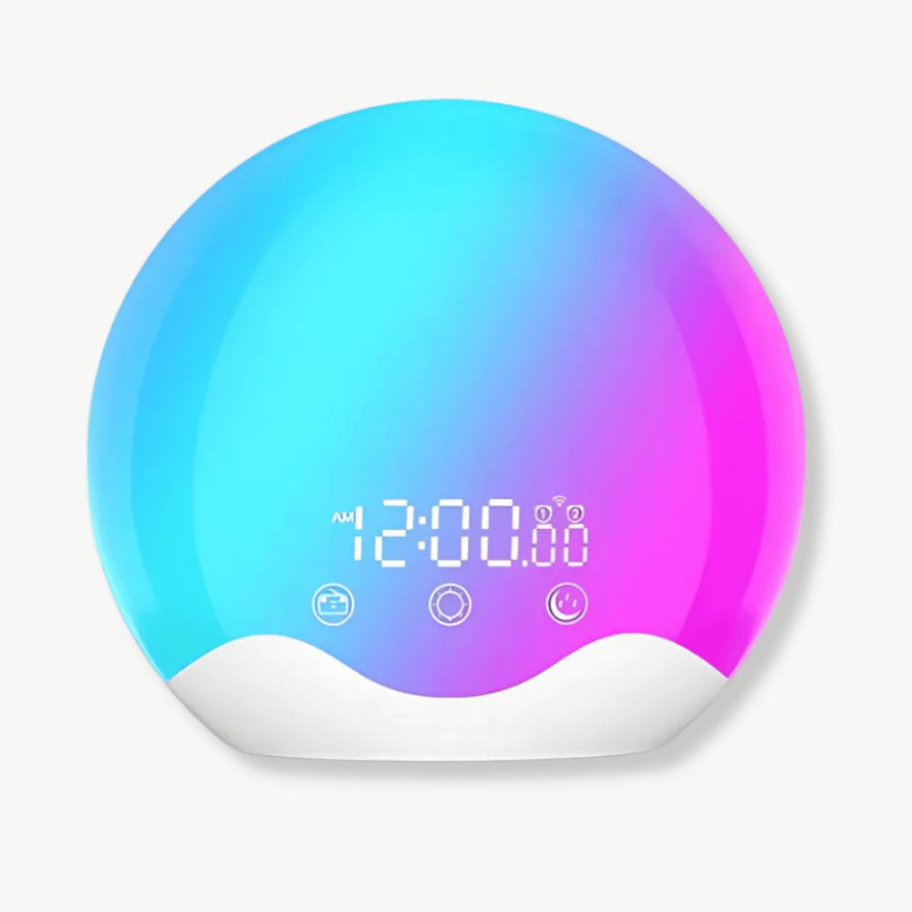 Sunrise alarm clock with warm multicolor glow on a bedside table