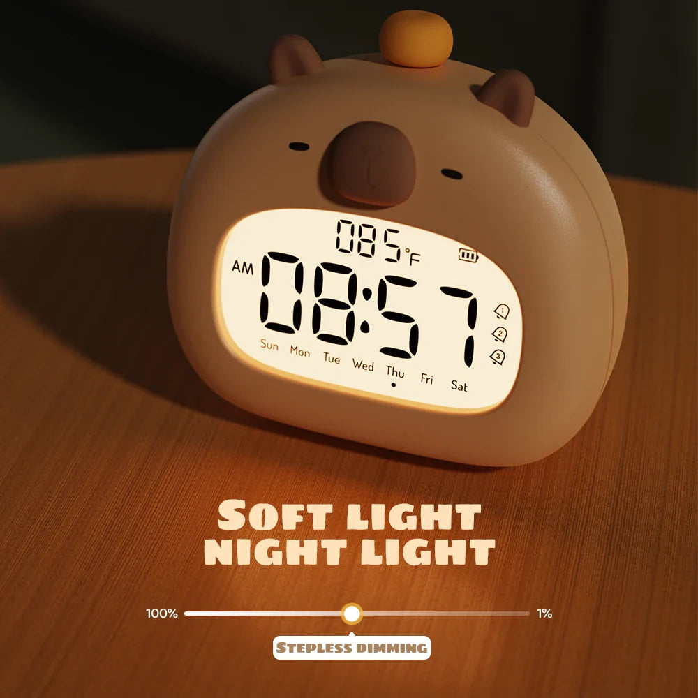 Kids LED alarm clock with night light in Panda style on a bedside table