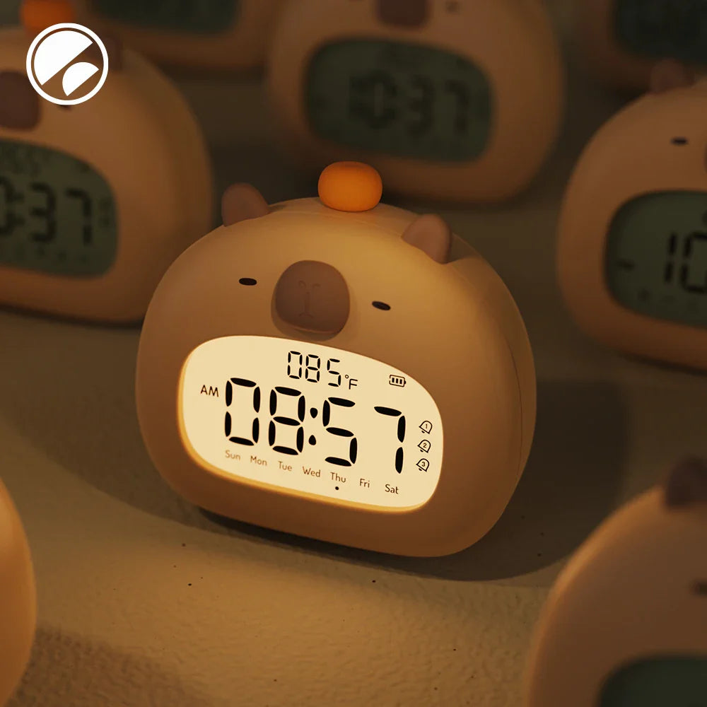 Close-up of LED digital display showing time and temperature on kids alarm clock