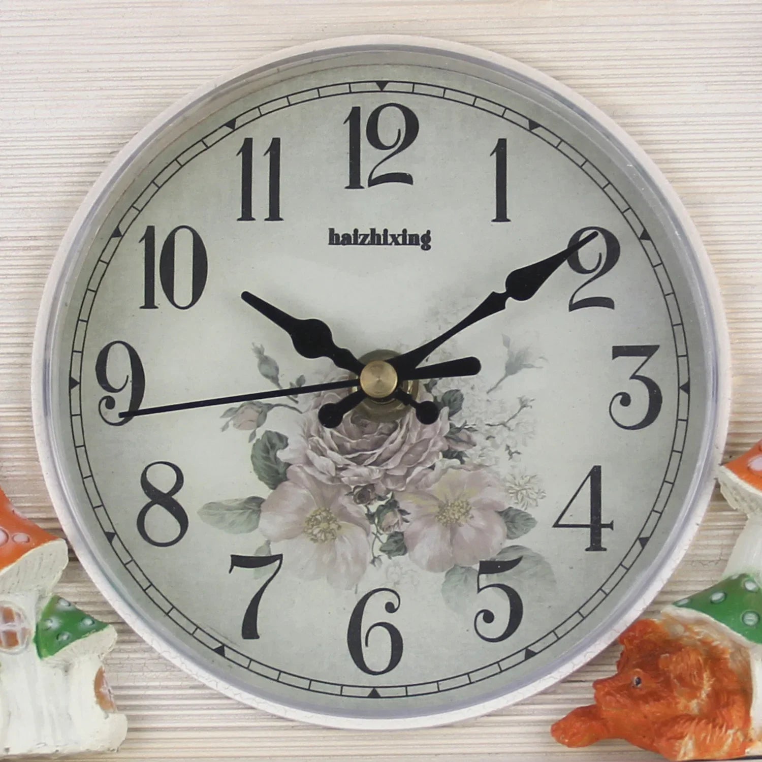 Cuckoo wall clock with white squirrel style variant displayed in living room