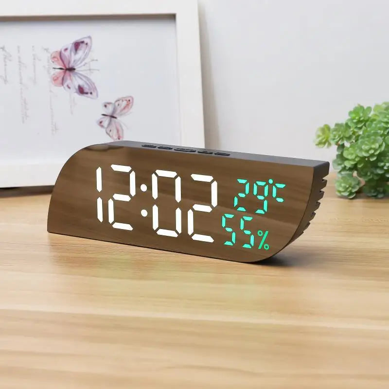 Sleek LED digital clock in bedroom setting with minimalist decor