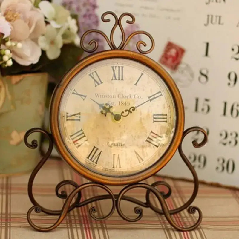 Retro iron desk clock displayed on a bedroom nightstand