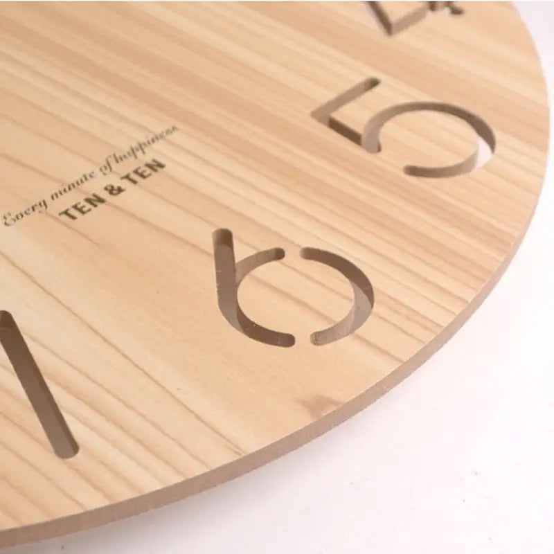 White bamboo wall clock with leaf design in Scandinavian bedroom