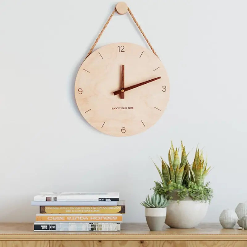 25 cm natural wood wall clock displayed in a modern living room