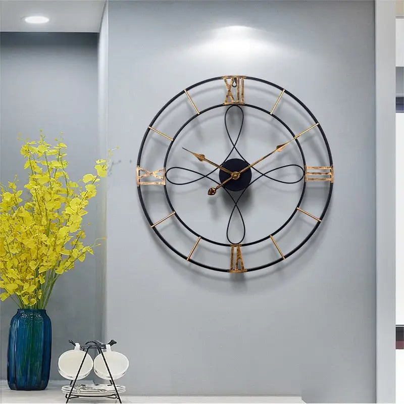 Detail of silent quartz movement on the black and gold iron wall clock