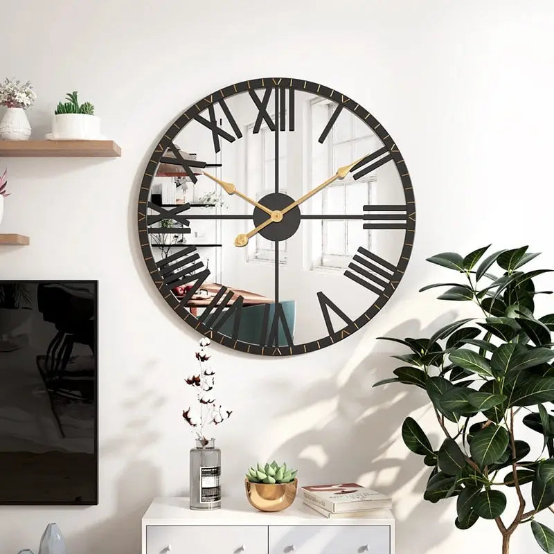 Black gold mirror wall clock displayed in a modern living room
