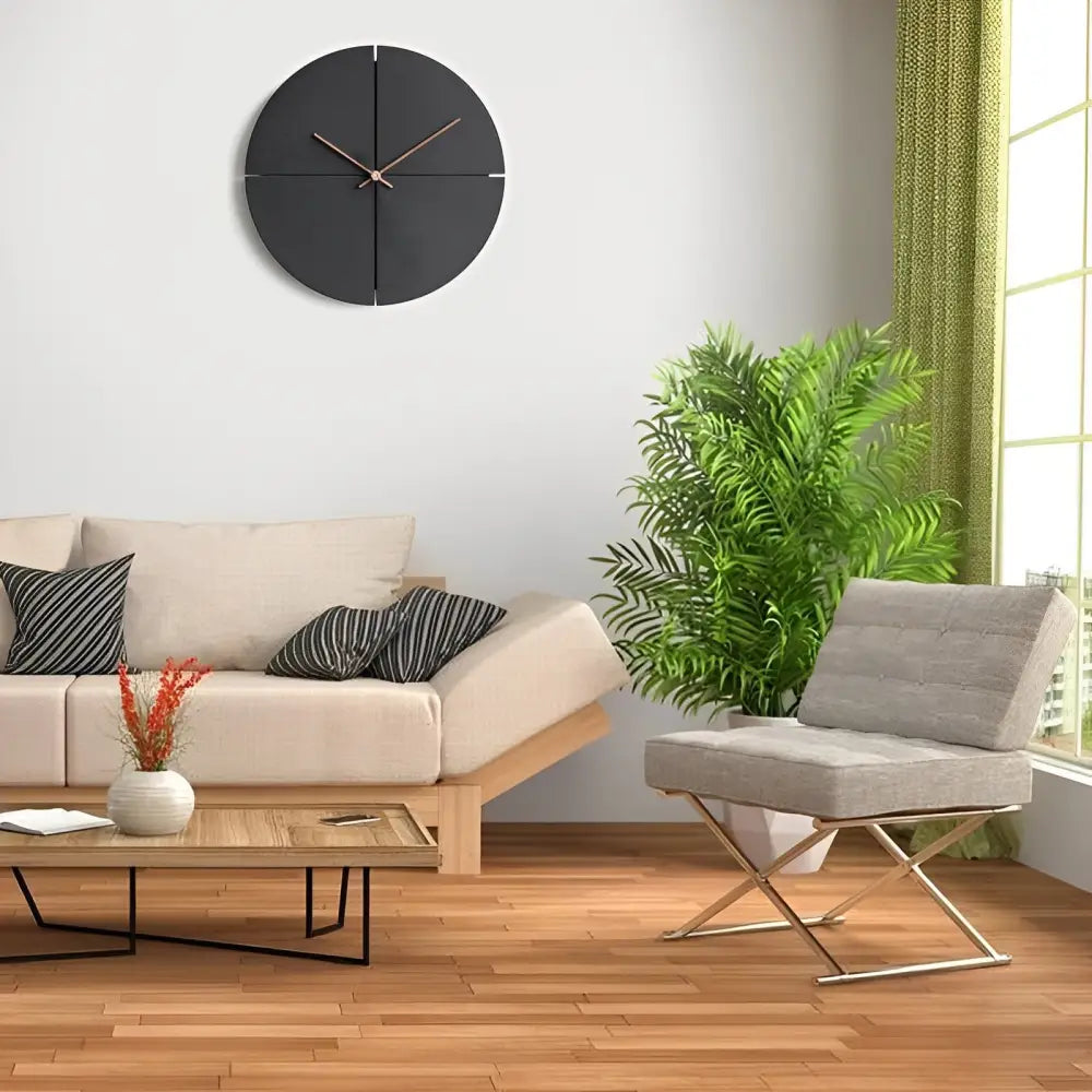Minimalist Scandinavian wall clock in black wood and bamboo on a white wall