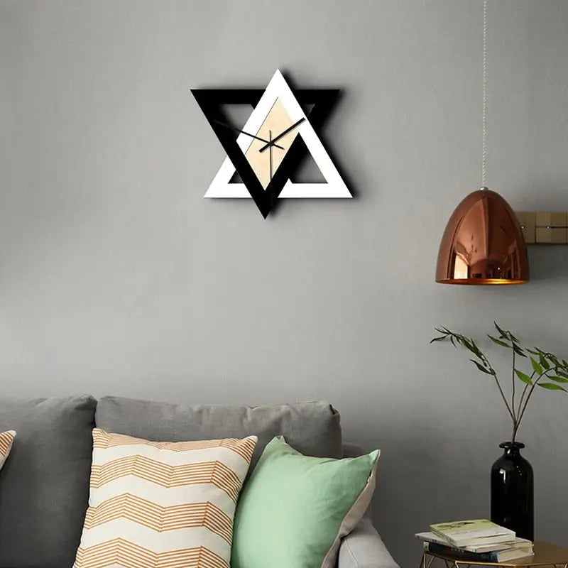 30 cm geometric triangle wall clock displayed in a modern living room