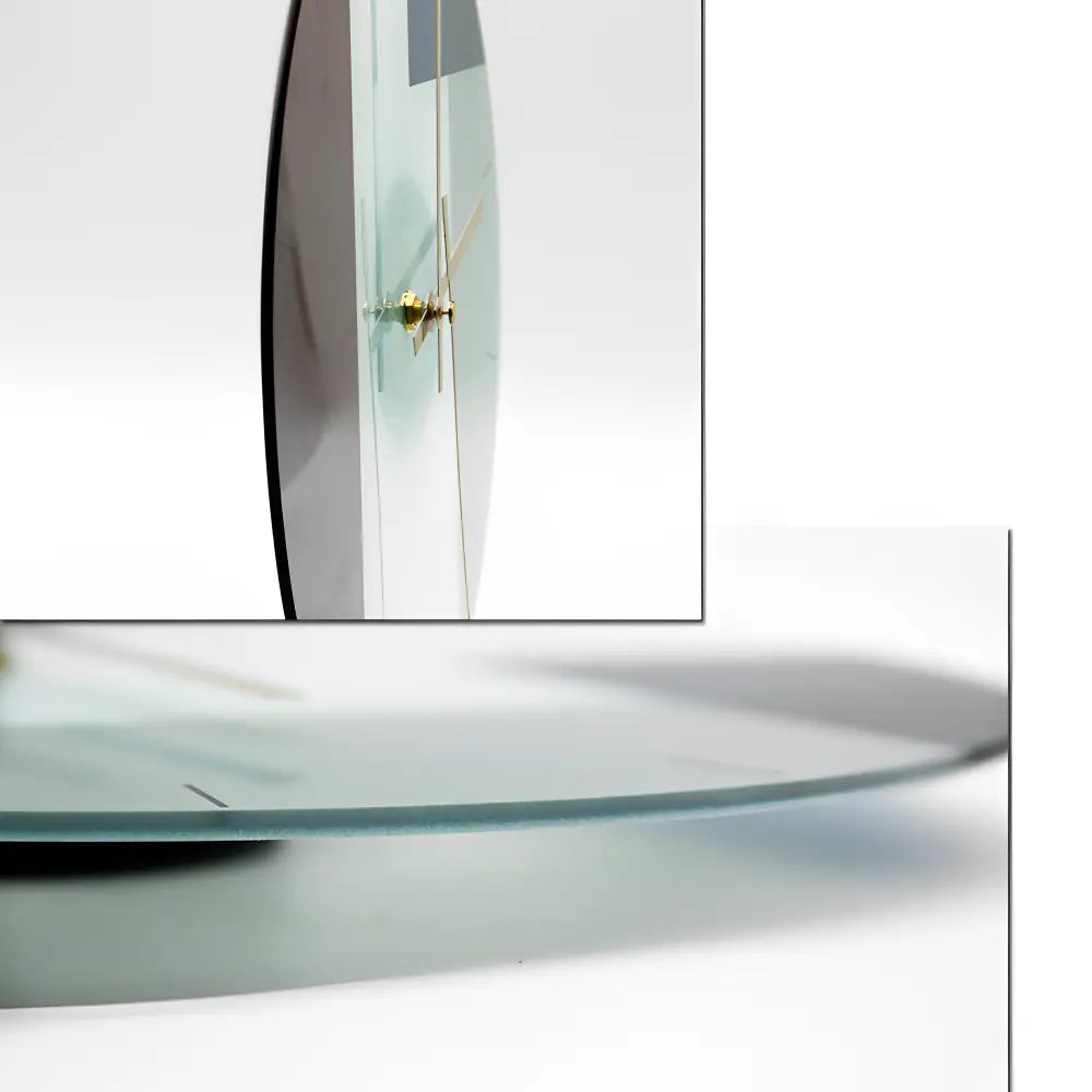Close-up of glass wall clock face showing crystal detail and hands