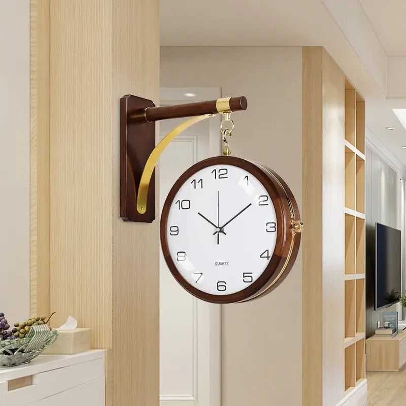 Close-up of analog hand display on double-faced wood wall clock