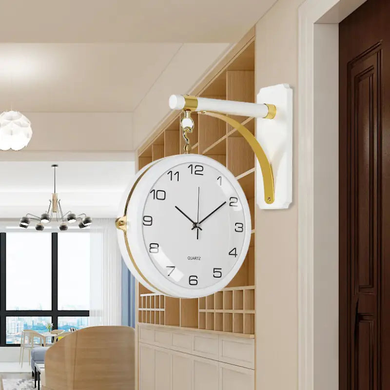 Double-sided wall clock in White and Black finish mounted on living room wall